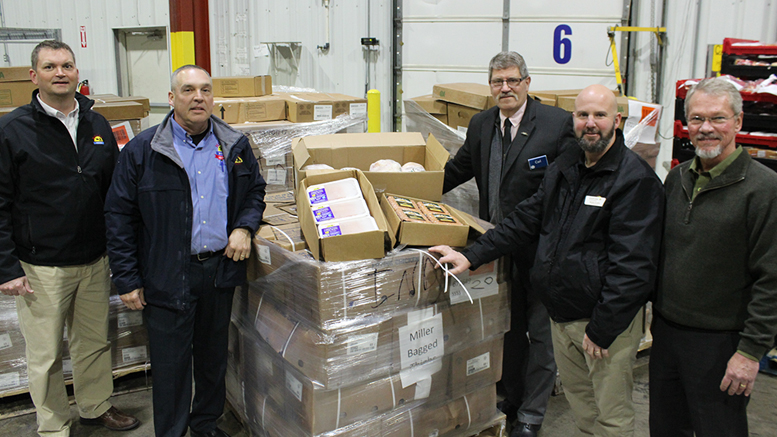 Representatives from Miller Amish Poultry, Second Harvest, and the new PayLess store gather to receive a donation of 6,800 pounds of poultry from Kroger stores. Left to right: Fred Lechlitner and Ken Rains, Miller Amish Poultry; Carl Vermilyer, Kroger; Barry Floyd, Empire; and Tim Kean, Second Harvest.