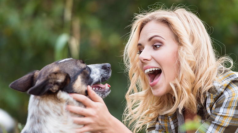 A brief walk with your dog is a great way to 'get moving.' Photo by story blocks