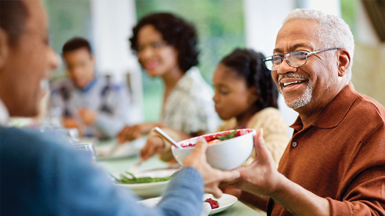 A group of people enjoy a healthy lunch at an IU Health cafeteria. Photo provided by IU Health.