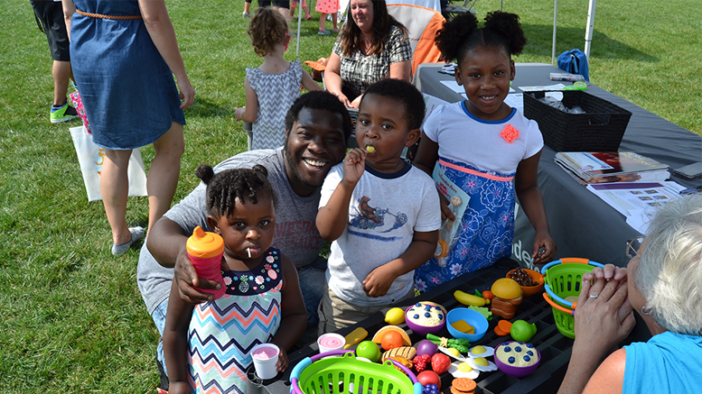 Families enjoy visiting community neighbors at Be My Neighbor Day 2017. Photo provided.