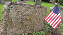 This flag in Beech Grove Cemetery decorates the grave of Lt. Marshall S. Hawke, a young Army flier killed in the crash of his B-25 back in 1943. Photo by: Nancy Carlson