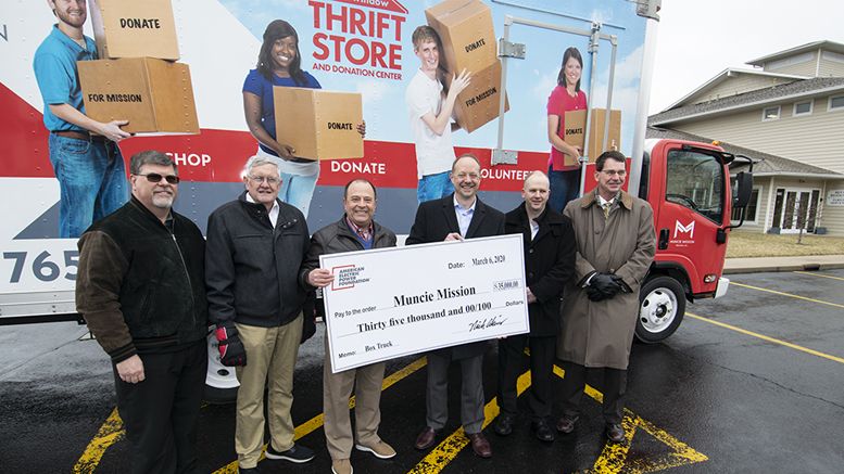 Pictured standing in front of the new delivery truck are: (L-R) Dale Lindley, Muncie Mission Board Member; Dr. Carl Siler, Muncie Mission Board Member; Frank Baldwin, President and CEO at Muncie Mission; Toby Thomas, President and COO at Indiana Michigan Power; Rob Keisling, Community Affairs Manager at American Electric Power; Martin Hillery, Muncie Mission Board Member. Photo by: Mike Rhodes