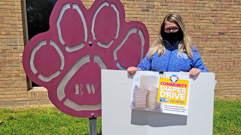 United Way’s Denise King, Director of Resource Development delivers diaper collection boxes. Photo provided