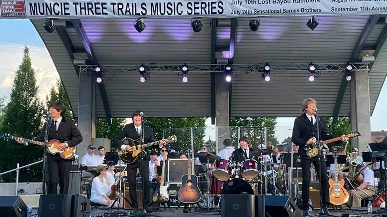 The community enjoyed a blast from the past as the Muncie Symphony Orchestra performed popular hits from The Beatles in a free outdoor concert at Canan Commons. Photo by Nancy Carlson
