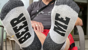 Do “beer me” socks send the right message to gout sufferers? Photo by Nancy Carlson