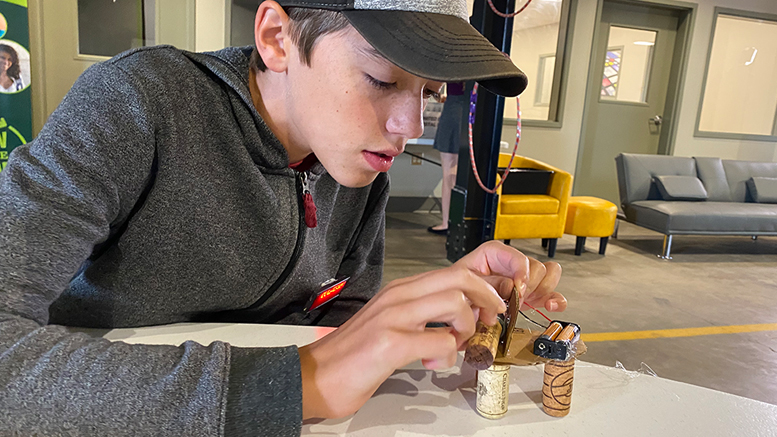 A student participant from Tech Camp summer 2021 is creating their own WobbleBot from a workshop kit. Photo by: Kyra Zylstra
