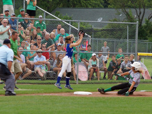 Yorktown’s Lexie Robertson safely stretches her hit into a triple.