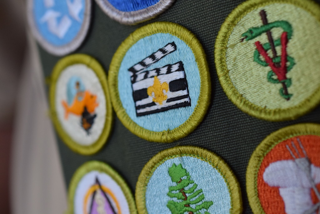 A few of the 137 merit badges on Charlie Murphy's sash.
