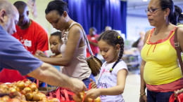 Child and mother at a food pantry. File photo.