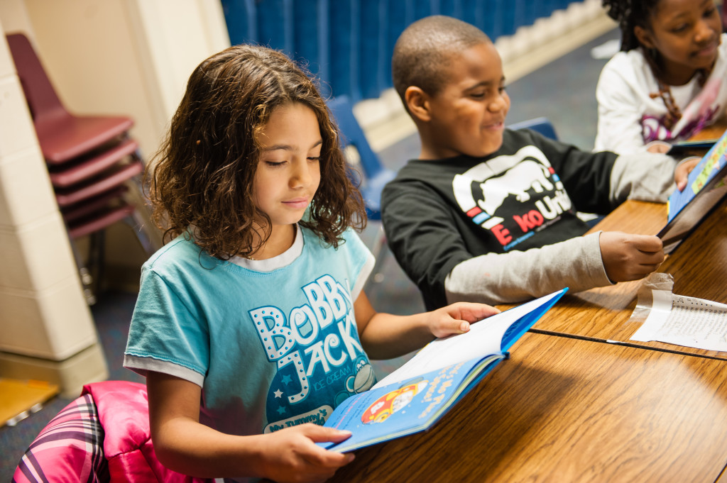 Kids reading. Photo provided