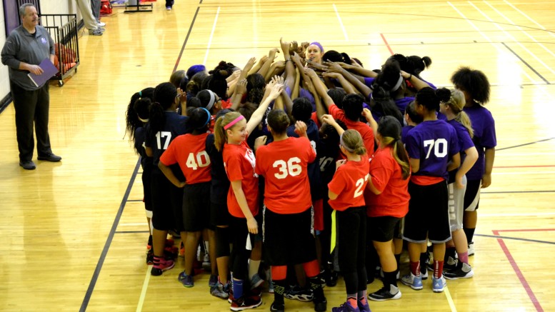 Ice League girls huddle. Photo provided.