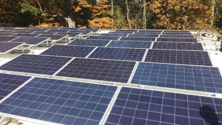 The upper roof of the “church in the woods” is just high enough to collect abundant solar energy. Photo provided.