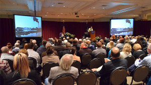 Phil Tevis of FlatLand Resources makes introductory remarks during today's announcement. Photo by: Mike Rhodes