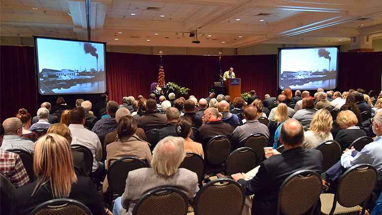 Phil Tevis of FlatLand Resources makes introductory remarks during today's announcement. Photo by: Mike Rhodes