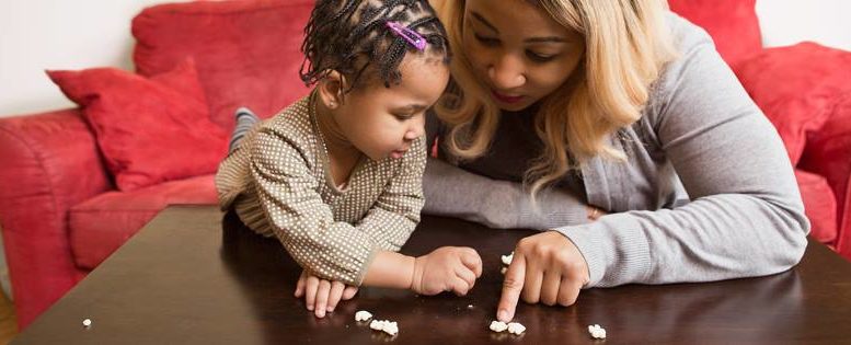 A young mother works with her child. Photo provided.