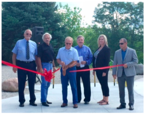 Ribbon cutting (L-R)— Bill Smith, MSD Board President; Joseph Evans, MSD Board Secretary; Dennis Tyler, Mayor of Muncie; Mike Cline, MSD Board Vice President; Nikki Grigsby, District Administrator;