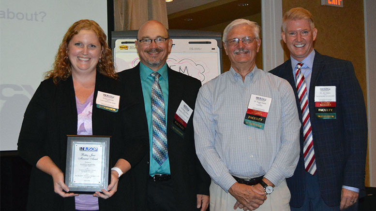 Pictured: (Left to right) Krista Hoevel, Dr. Michael Johnson, Dr. Hugh Hanlin and Dr. Jim Dalton, IN-AJSOP, presenting the Bobby Jones Award at the 12th annual conference of the IN-AJSOP. Photo provided.