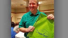 Matt Howell shows off his DreamFest "Dream Kit" he recently won at the Muncie on the Move breakfast. Photo provided.