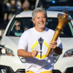 Indiana Bicentennial Torch Relay in Delaware County. Jeff Bird carries the torch. Photo by: Sadie Lebo