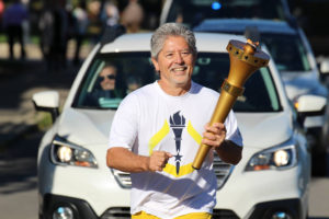 Indiana Bicentennial Torch Relay in Delaware County. Jeff Bird carries the torch. Photo by: Sadie Lebo