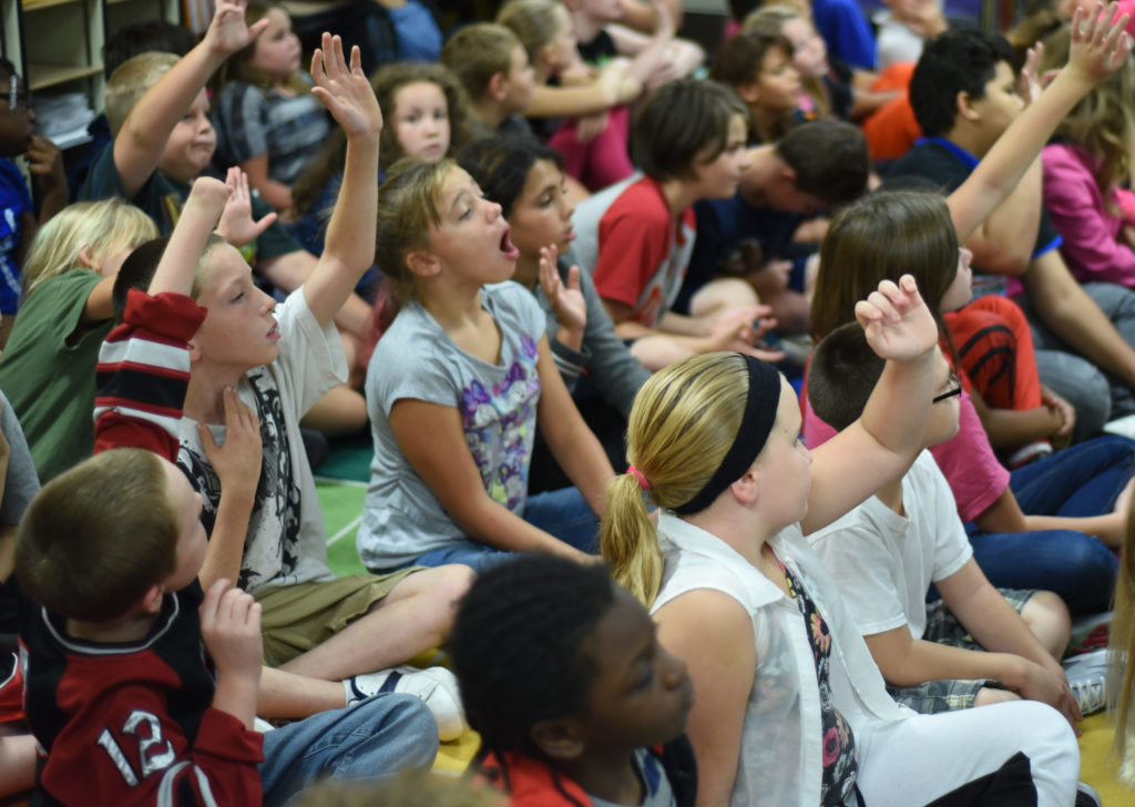 Students at South View Elementary School engage with James Whitcomb Riley re-enactor, Chadwick Gillenwater.