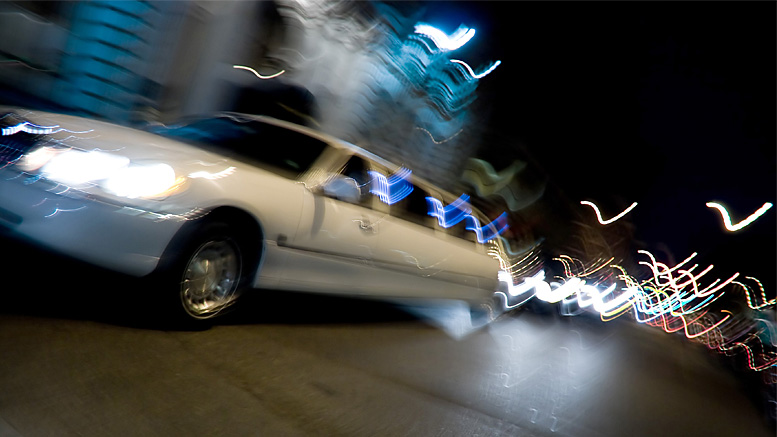 A celebrity limo arrives for the red carpet. Photo by: graphic stock.