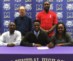 Khamasi Muhiga, family, and Coach Wafer.