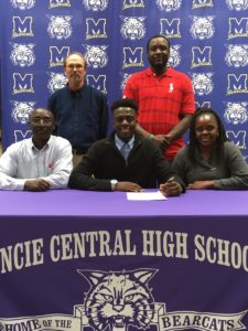 Khamasi Muhiga, family, and Coach Wafer.