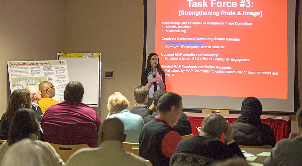 Muncie Action Plan Coordinator, Aimee Fant, introduces the MAP task forces to session participants. Photo provided. 