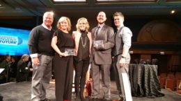 Holly Stachler (2nd from left) receiving her award in Chicago. Photo by: Pete Just