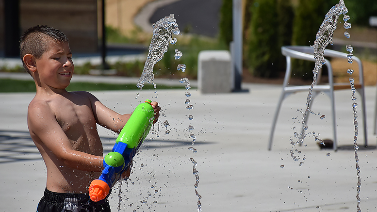 Kids enjoy the water features on June 5th. Photo by: Mike Rhodes