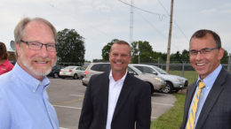 Jay Julian, Pat Botts and Chris Caldwell are pictured outside the offices of Woof Boom radio. Photo by: Mike Rhodes