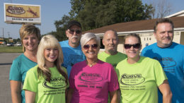 The staff outside The Curve Inn in Alexandria.