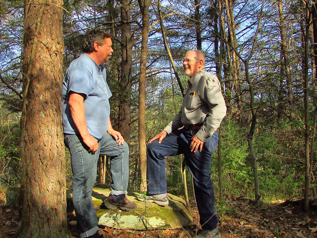 Photo of Andrew and David in the woods. Photo provided.