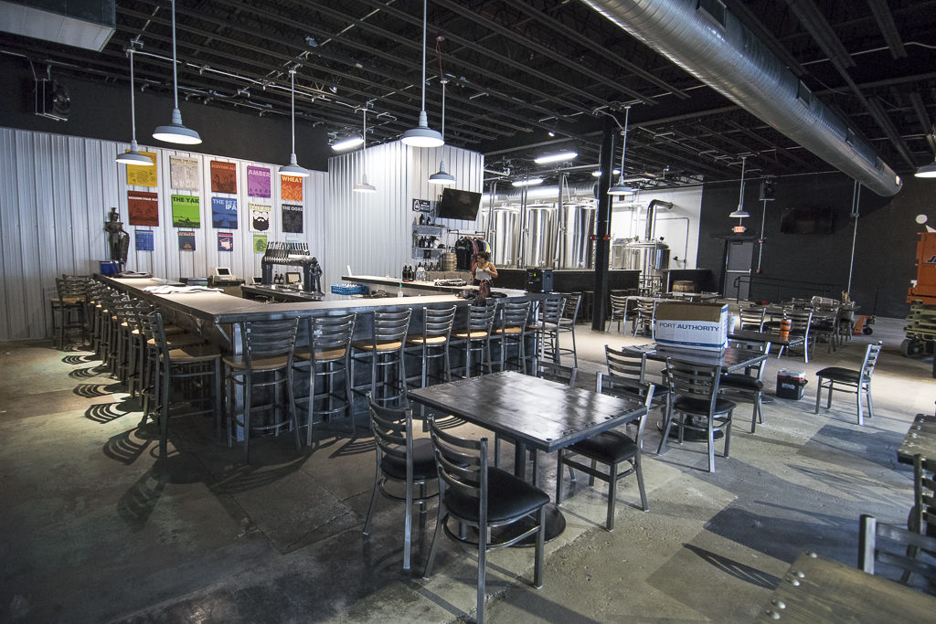 Adding the final touches to the interior of the new Guardian Brewery location as photographed on September 15th. Photo by: Mike Rhodes