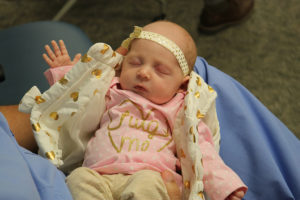 Baby Emeline chooses sleeping over socializing during a CenteringPregnancy visit. The final group visit allows for the mothers to meet and interact with the new babies. Photo provided.