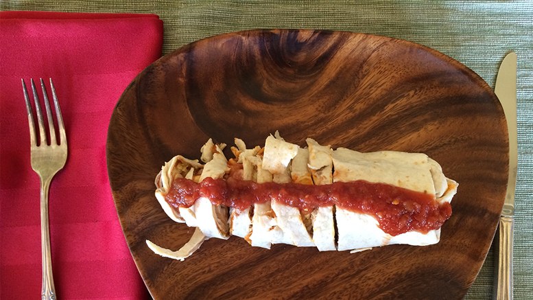 A burrito capped by thickly folded tortilla nearly did him in. Photo by: Nancy Carlson