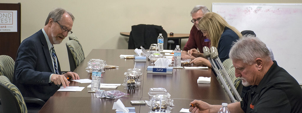 (L-R) Jay Julian, Jeff Sekora, Cassie Minch and Jack Surface are pictured during the difficult judging process during the Chocolate Celebration. Photo by: Mike Rhodes