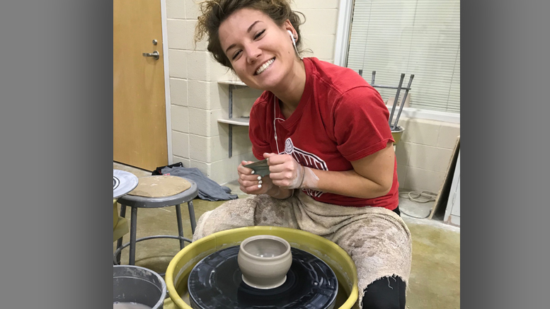 Sarah Anderson, a junior studying sculpture, creates a ceramic bowl. Photo provided.