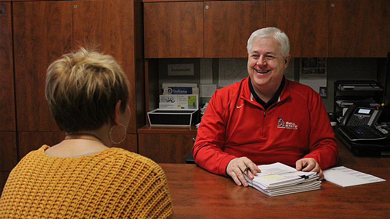 Ted Baker is pictured providing one-on-one business coaching services to a client. Photo provided.