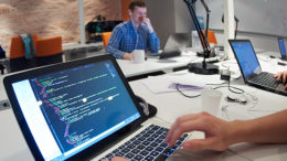 Student entrepreneurs at work in a group office setting. Photo by: graphicstock