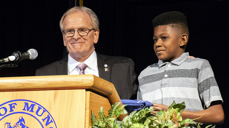 Mayor Dennis Tyler is pictured with Terry Miles, who authored the book, "The Shot Heard Around The Town." Mayor Tyler named Terry an Honorary Deputy Mayor of the City of Muncie. Photo by: Mike Rhodes