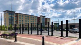 Canan Commons Grates, the site of "the hopes we wear on our backs", a participatory public weaving project by PlySpace Resident Artist Kacie Lyn Martinez.