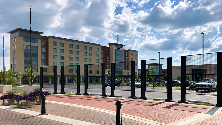 Canan Commons Grates, the site of "the hopes we wear on our backs", a participatory public weaving project by PlySpace Resident Artist Kacie Lyn Martinez.