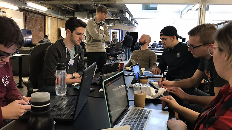 Ball State students Alex Kane and Guadalupe Vega are pictured working with their team at Startup Weekend Columbus. Kane joined the organizing team for Startup Weekend Muncie after attending the event in Columbus. Photo provided.