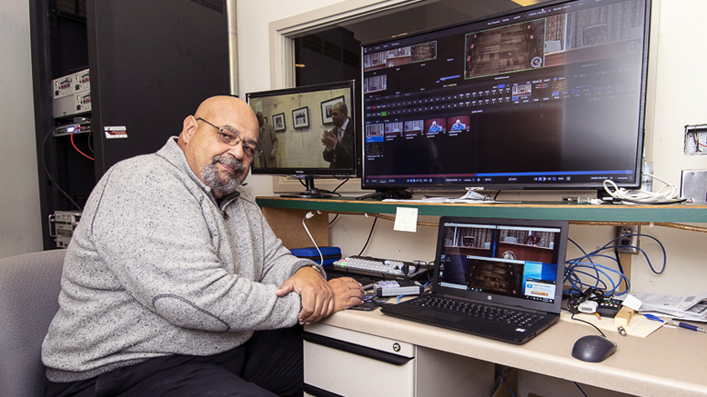 City of Muncie media director, Roger Overbey is pictured in the AV room operating the new equipment. Photo by: Mike Rhodes