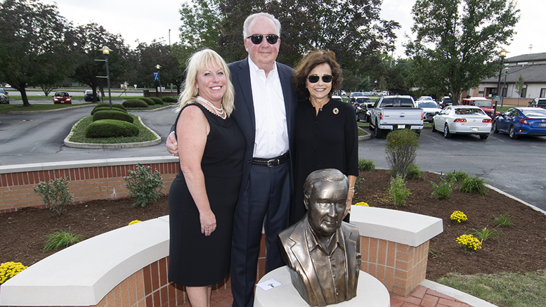 Kelly Stanley is pictured behind the sculpture created by Yorktown artist Kenneth Ryden. Also pictured is Donna Stanley (R) and Polly Craig (L) Executive Director, YOC foundation. Photo by: Mike Rhodes