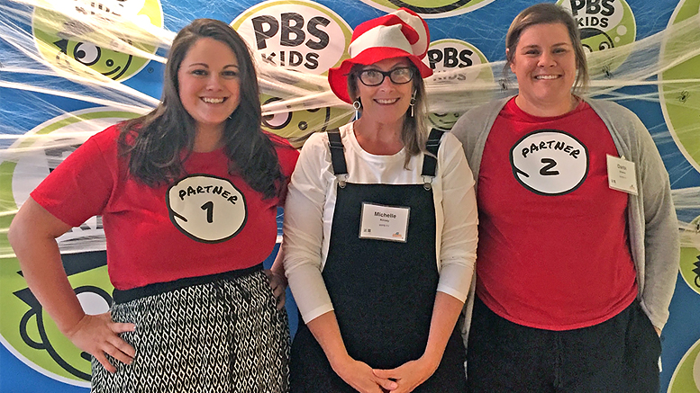 The Cat (in the Hat) is out of the bag! WIPB-TV has received a grant to bring science and literacy programming to young learners on the south side of Muncie. Michelle Kinsey, Community Engagement and Grants Manager for WIPB, will work with community partners including Amanda Owen of Ross Community Center (left) and Darbi Strahle of Habitat for Humanity (right), on the project. Photo provided