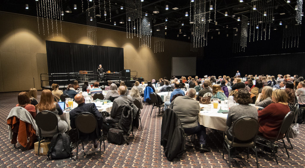 Conference attendees are pictured during Eastman's presentation.