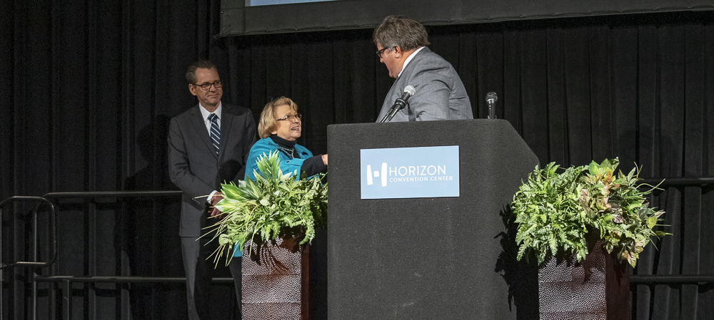 Pictured L-R: Scott McKee, Sharon Crain, and James Williams. Sharon was congratulated for her 51 years of service with MCS.